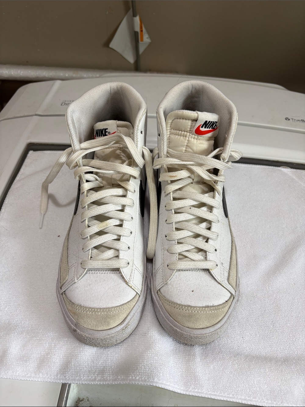 Nike Cream/White High-Top Sneakers with Black Swoosh and Red Logo